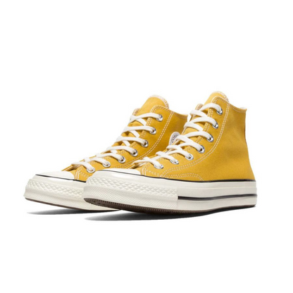 Yellow Chuck Taylor High Tops